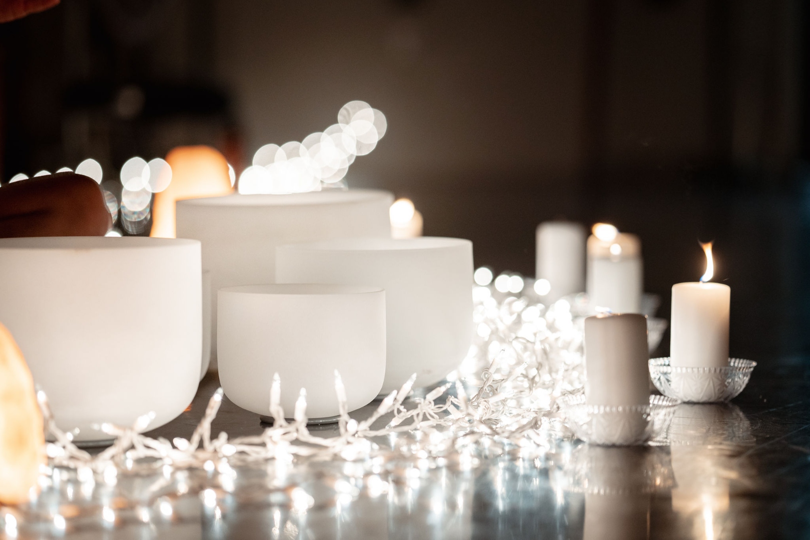 Close-up of frosted crystal singing bowls