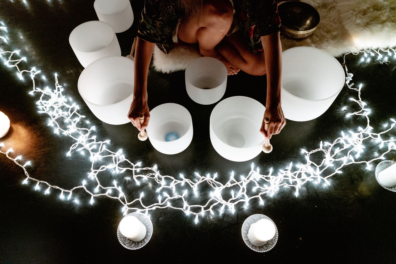 Overhead view of crystal singing bowl arrangement